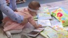 Да обичаш книгите от малка: бебе на 7 месеца вече има читателска карта в библиотеката във Варна 